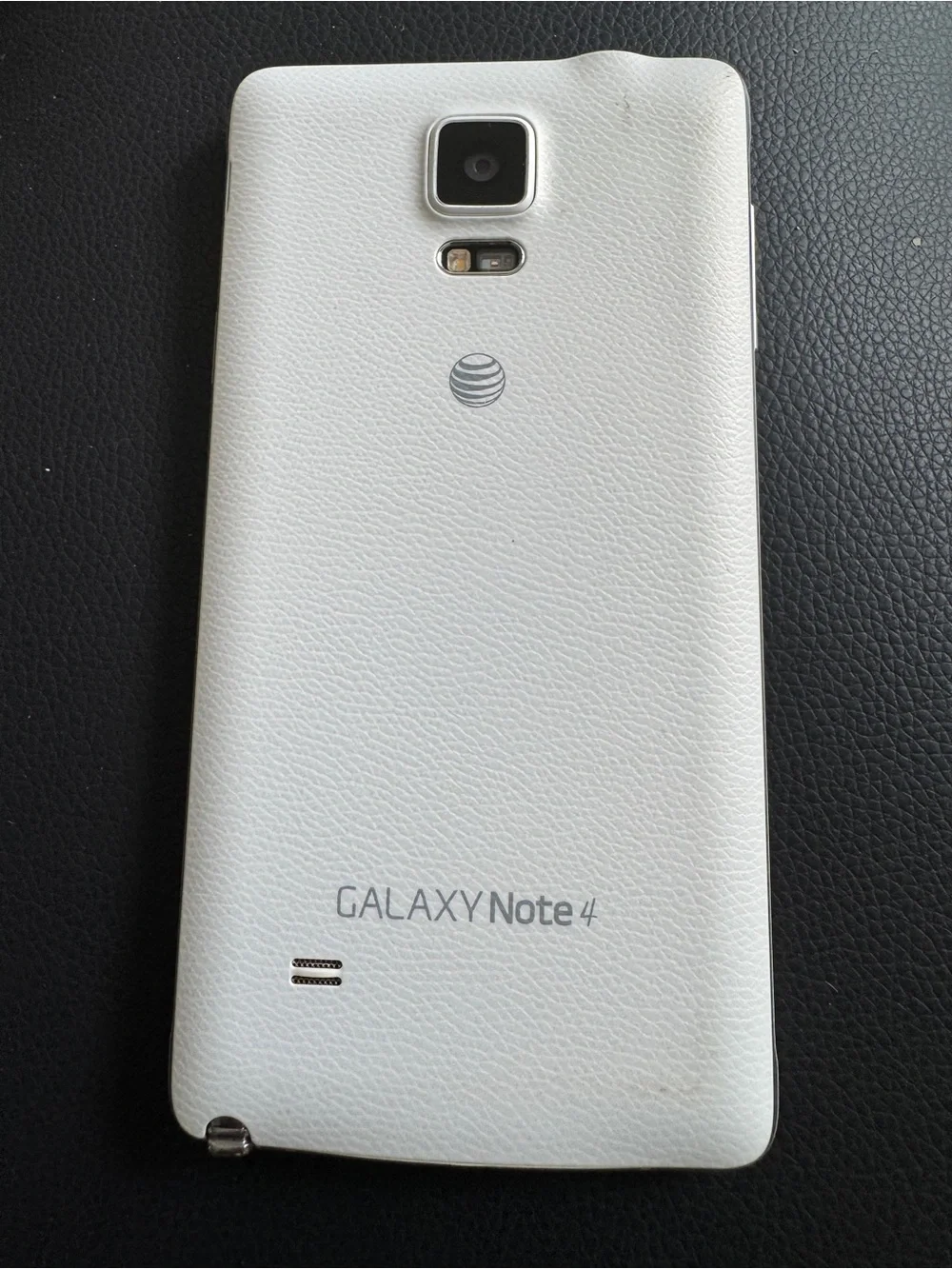 Samsung Galaxy Note 4 AT&T Unlocked 32GB includes stylus.
